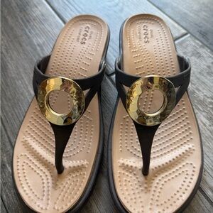 Crocs Women's Black and Gold Sandals